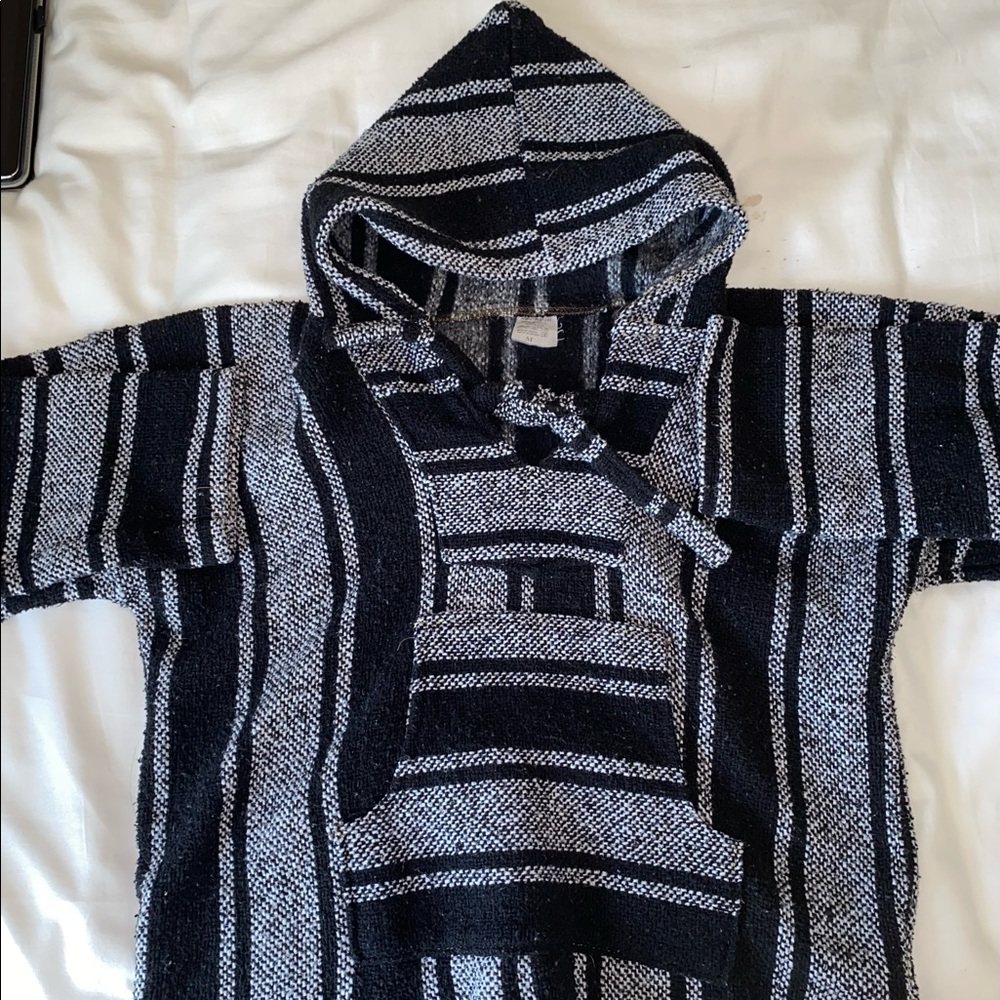 Poncho, keeps me very warm tbh